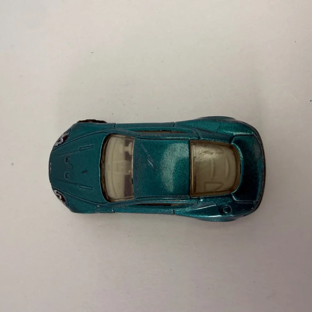 Hot Wheels Aston Martin DBS Metallic Teal 2010 All Stars 1/64 Diecast Car R6459